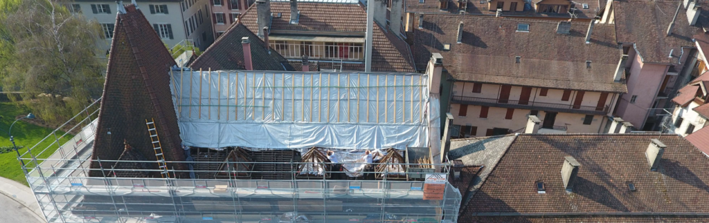 Rénovation de la toiture d'un bâtiment avec Triso-Toiture